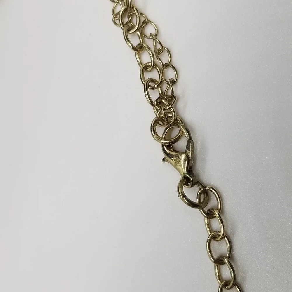 gold tone crystal necklace leafy with butterfly